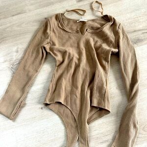 New In body suit tan new.